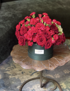 Mel | Red Florals Set Against Green Hydrangeas